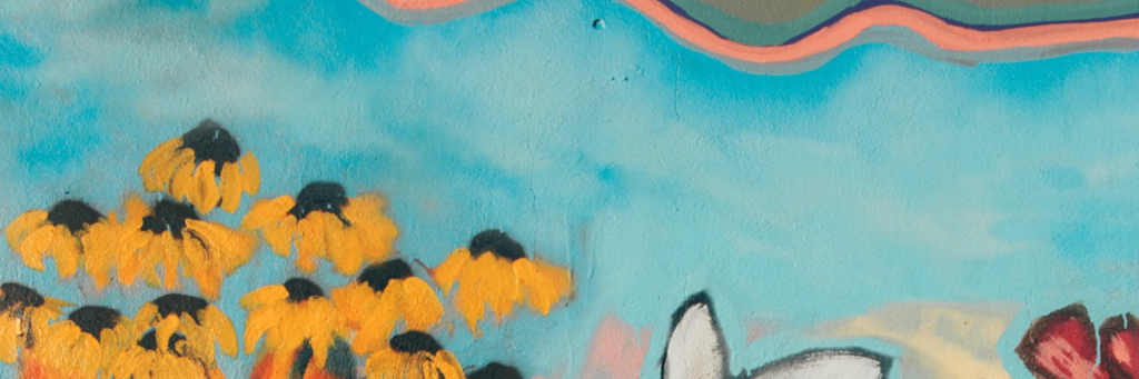 Ilustracja do artykułu, przedstawia kolorowy mural z kwiatami